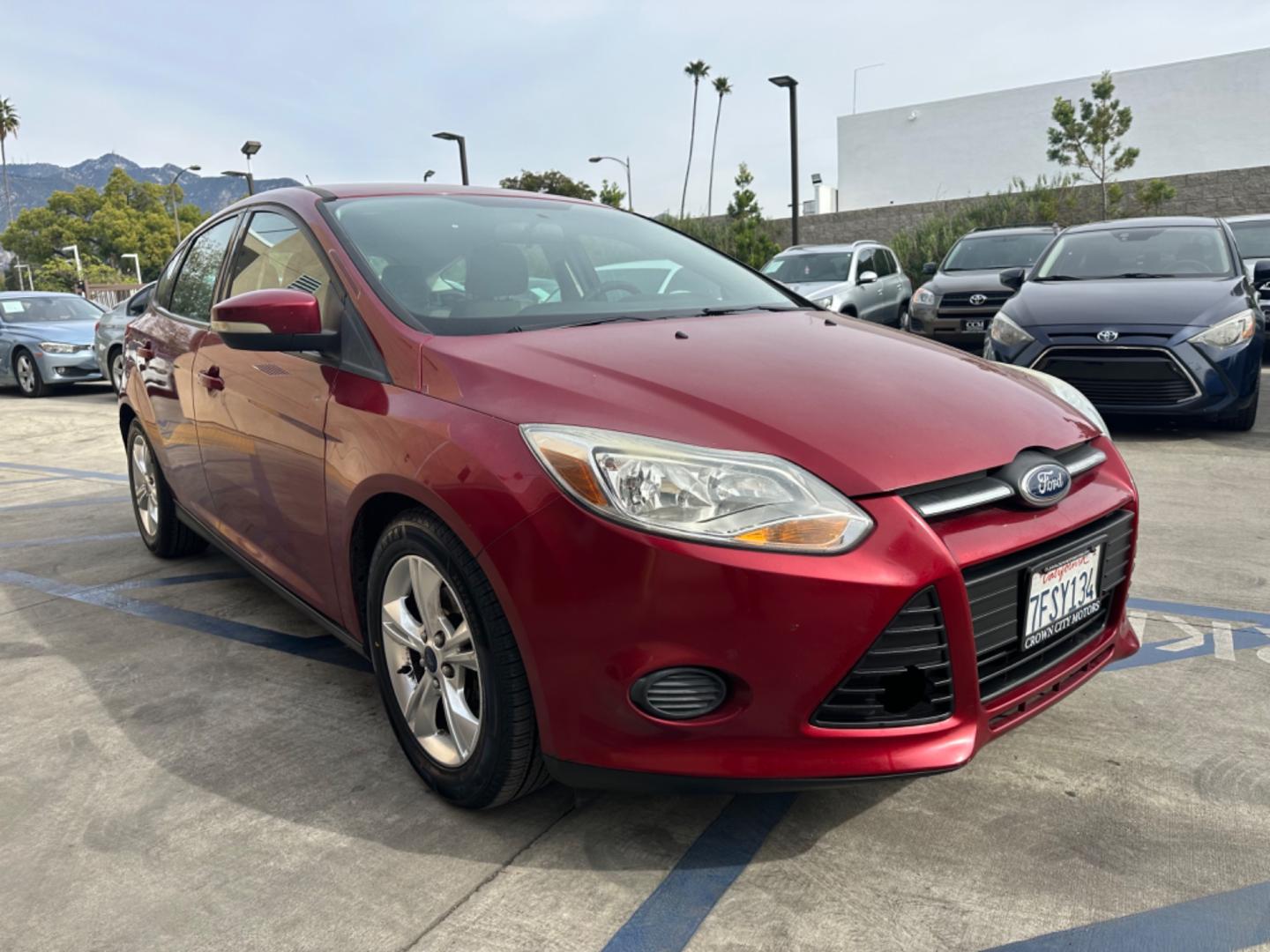 2014 RED /Gray Ford Focus Cloth (1FADP3K24EL) with an 4 Cylinders engine, Automatic transmission, located at 30 S. Berkeley Avenue, Pasadena, CA, 91107, (626) 248-7567, 34.145447, -118.109398 - Good Value! Good MPG! - Photo#2